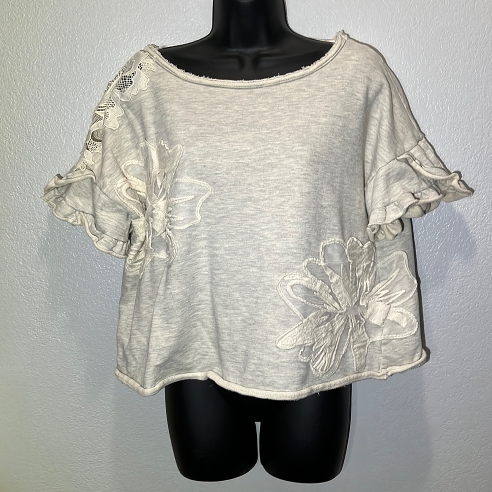 Oddly cropped short sleeve sweatshirt